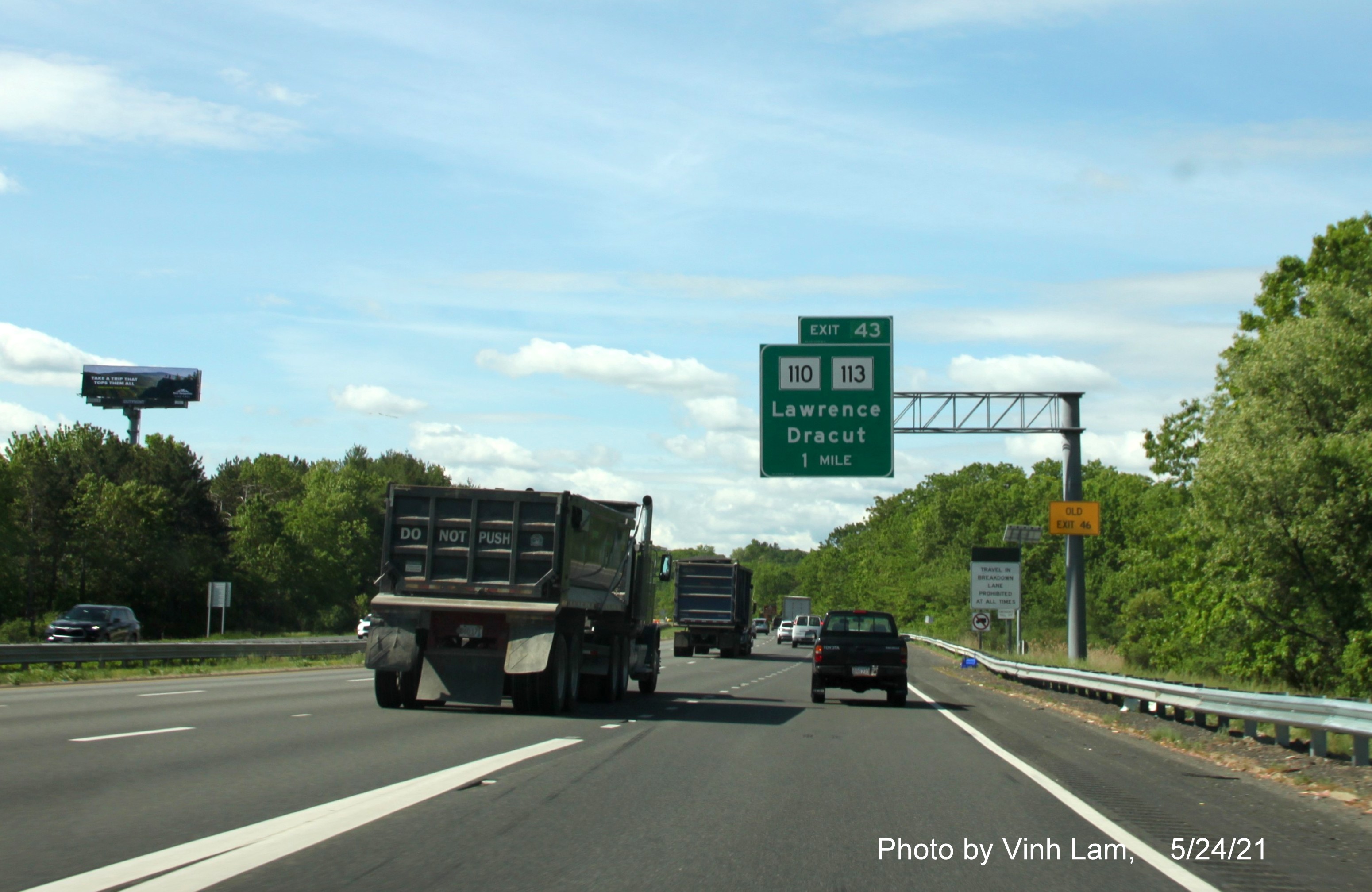 Image of 1 mile advance overhead sign for MA 110/113 exit with new milepost based exit number and yellow Old Exit 45 advisory sign on support on I-93 South in Andover, by Vinh Lam, May 2021