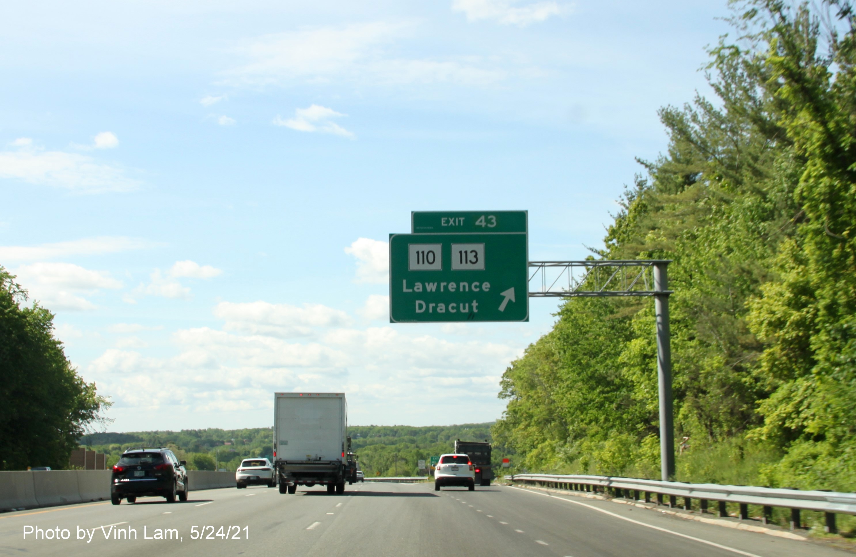 Image of overhead ramp sign for MA 110/113 exit with new milepost based exit number on I-93 South in Andover, by Vinh Lam, May 2021