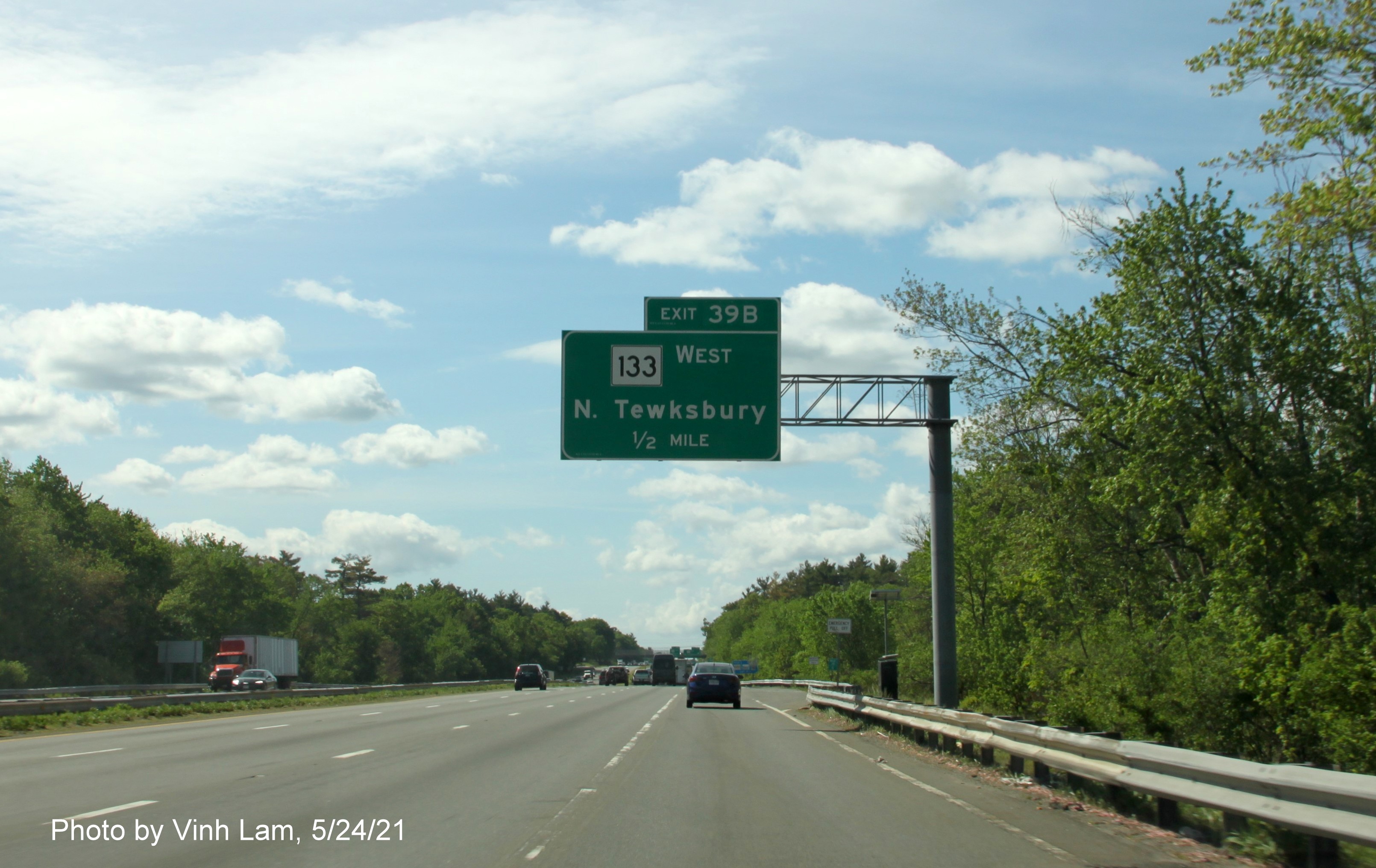 Image of 1/2 mile advance overhead sign for MA 133 West exit with new milepost based exit number on I-93 South in Andover, by Vinh Lam, May 2021