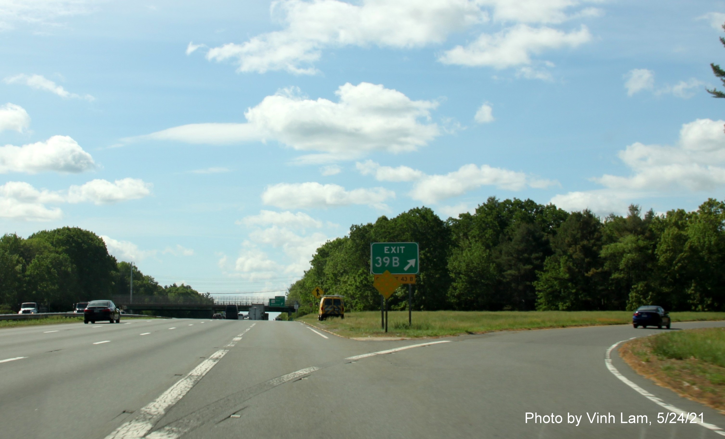 Image of gore sign for MA 133 West exit with new milepost based exit number on I-93 South in Andover, by Vinh Lam, May 2021