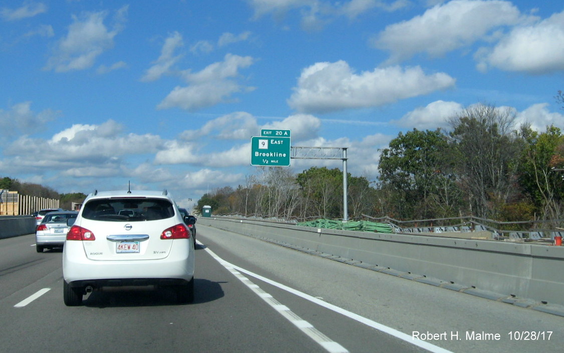 Image of new overhead exit sign for MA 9 and shoulder construction work along I-95 North in Add-A-Lane Project work zone in Needham