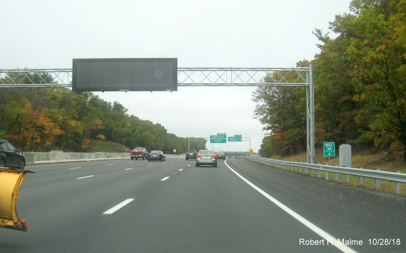 Image of completed 4-lanes of I-95 North heading under VMS gantry in completed Add-A-Lane Project work zone in Needham