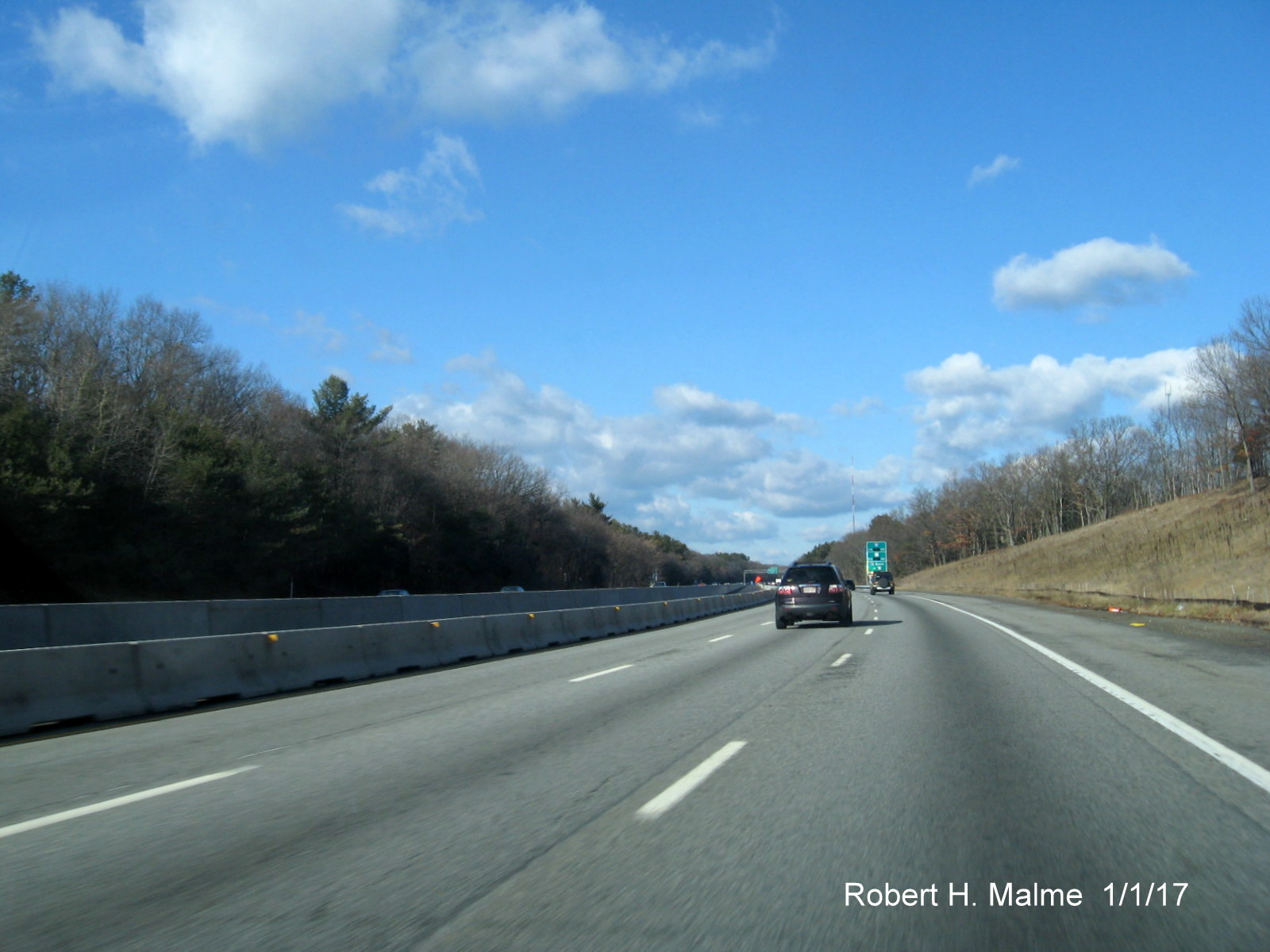 Image of construction of permanent median barrier in Add-A-Lane work zone from I-95/128 North in Needham