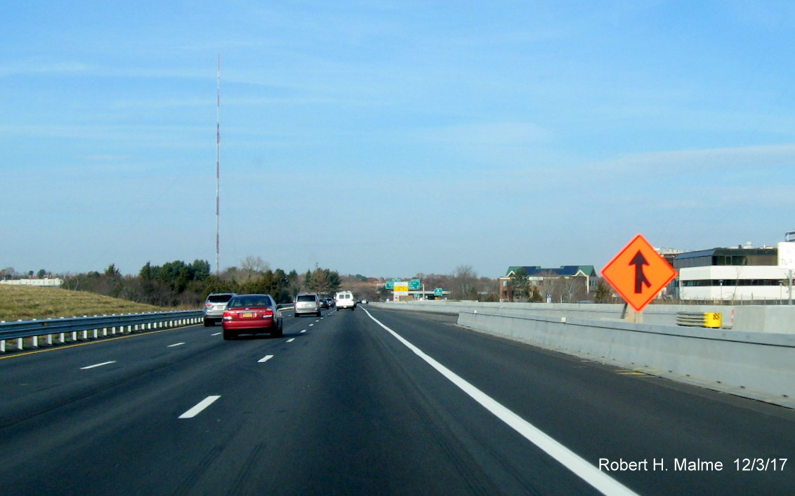 Image of temporary advisory sign marking merge of newly opened Kendrick St ramp to I-95 North in Add-A-Lane Project work zone in Needham
