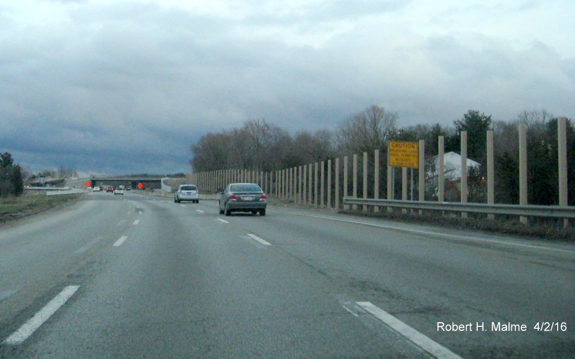 Image of noise barrier wall construction approaching Kendrick St. on I-95 South in Dedham