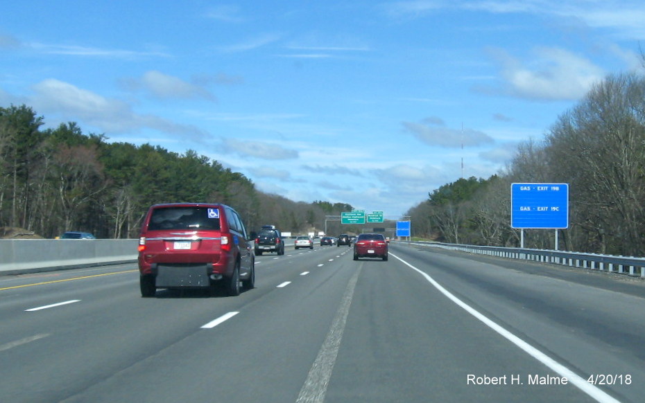 Images of new blue services sign put up along I-95/MA 128 north in Add-A-Lane Project wor zone in Needham