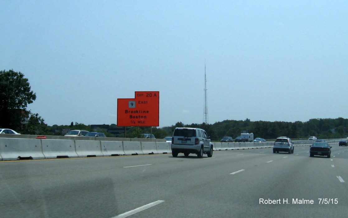 Image of temporary exit signage and construction barriers at northern end of Add A Lane project on I-95 South in Newton