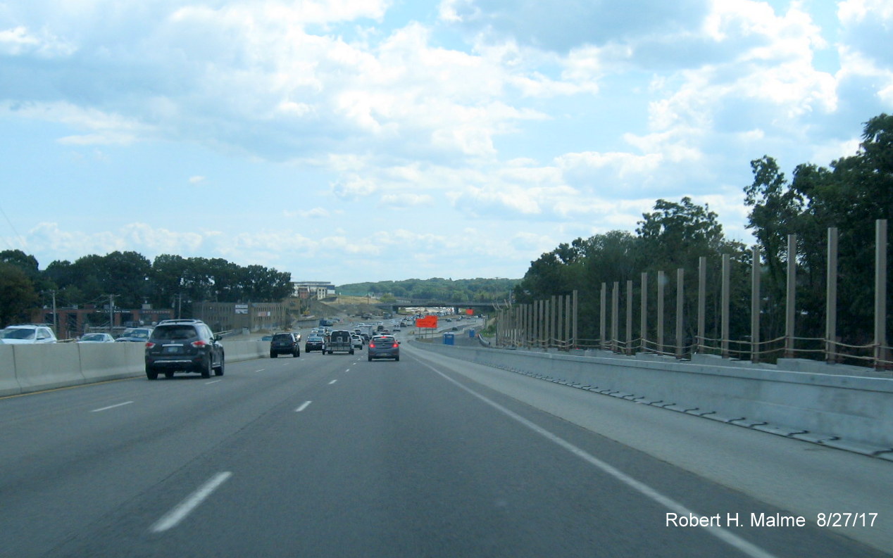 Image taken of noise barrier wall construction along I-95 South in Add-A-Lane Project construction zone in Needham