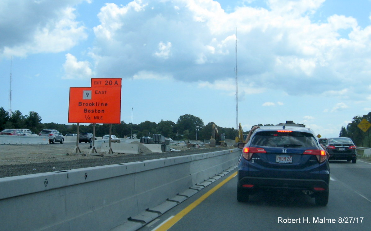 Image of temporary MA 9 exit sign now in between I-95 South traffic lanes in Add-A-Lane Project work zone in Wellesley