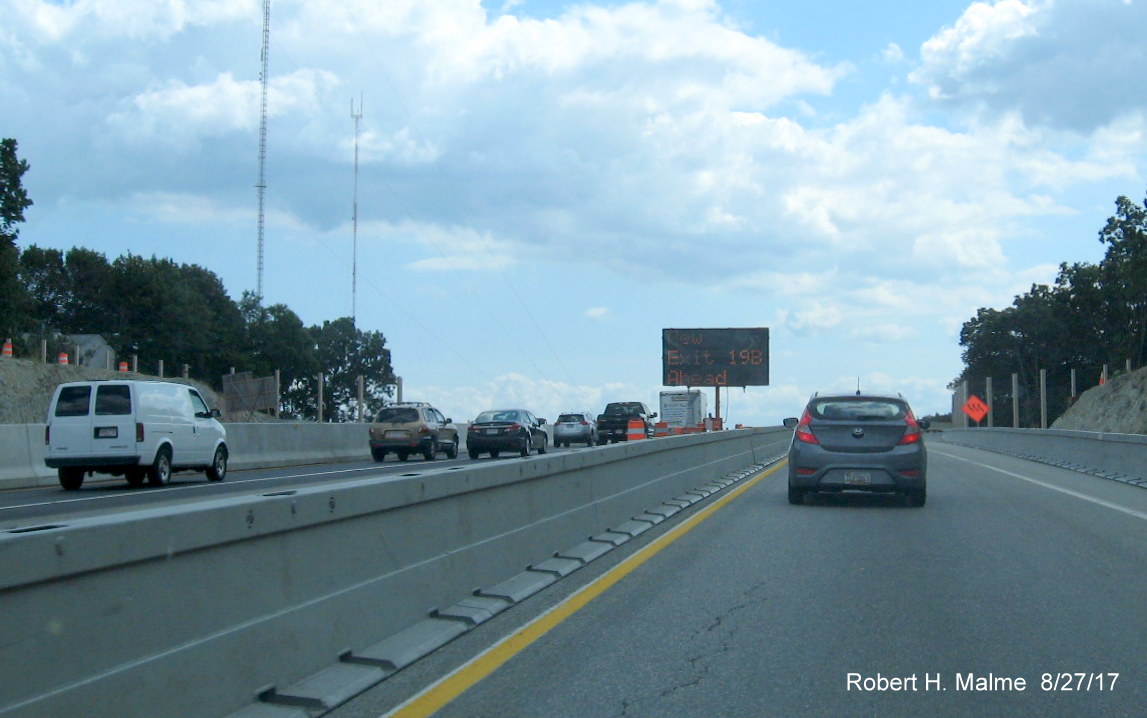 Image taken of variable message sign on I-95 South in Needham alerting drivers to new location of first Highland Ave exit in Needham