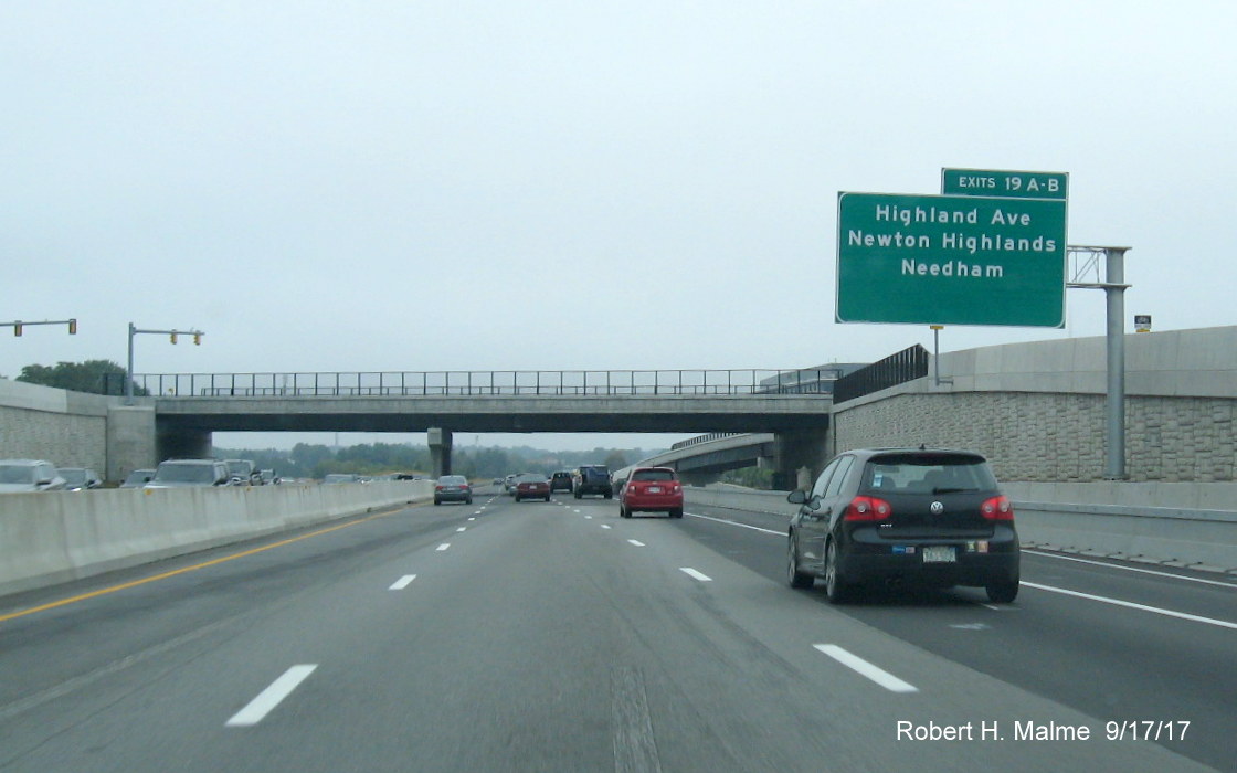 Image of new cantilever exit sign for Highland Ave prior to Kendrick St bridge on I-95 North in Needham