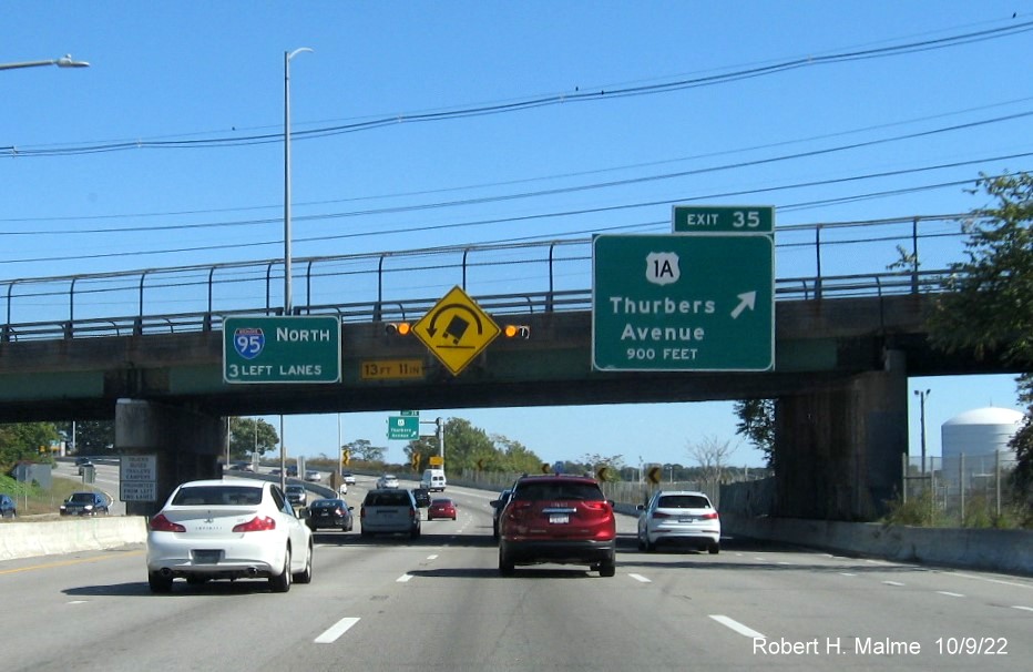 Image of 900 foot advance overhead sign for US 1A exit with new milepost based exit number on I-95 North in Providence,  October 2022