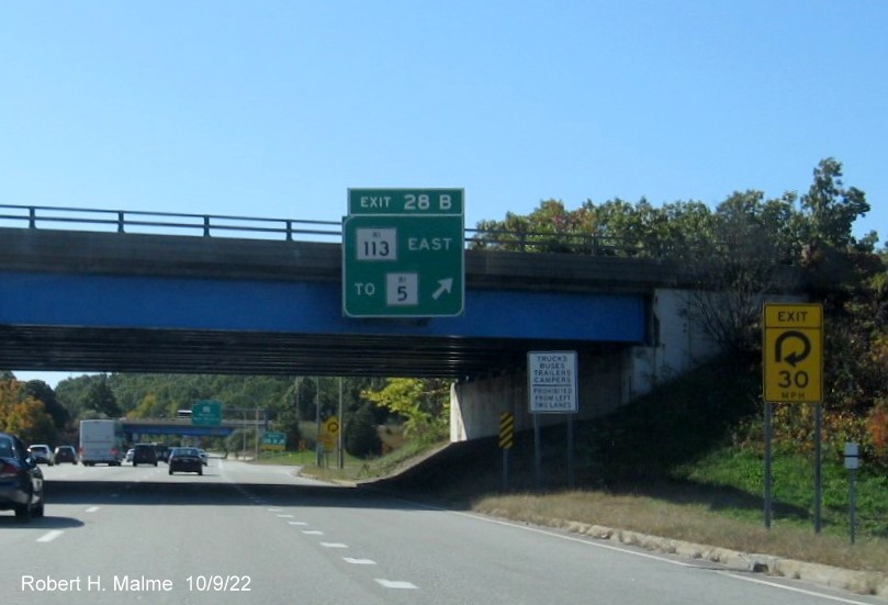 Image of 1 mile advance overhead sign for RI 113 and To I-295 North exits with new milepost based exit number on I-95 South in Warwick, October 2022