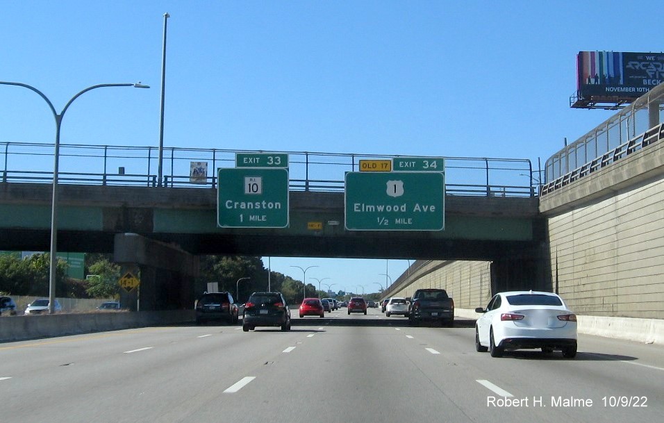 Image of 1/2 mile advance overhead sign for US 1/Elmwood Avenue exit with new milepost based exit number on I-95 South in Providence, October 2022