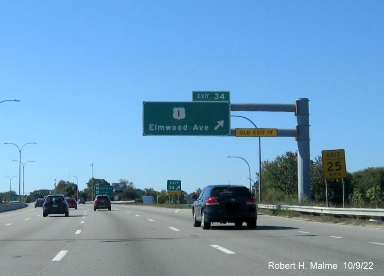Image of bridge mounted 1 mile advance sign for US 1/Elmwood Avenue exit with new milepost based exit number on I-95 South in Providence, October 2022