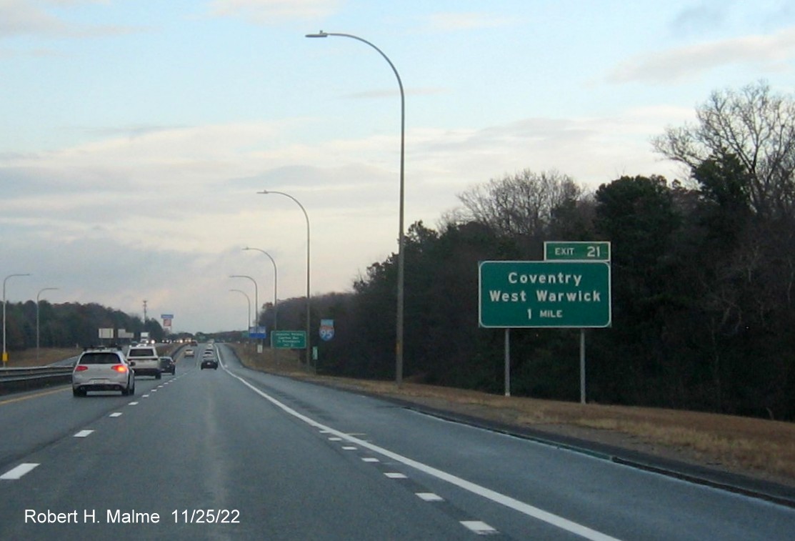 Image of ground mouted 1 mile advance sign for Coventry/West Warwick exit with new milepost based exit number, but no old exit number sign, on I-95 North, November 2022