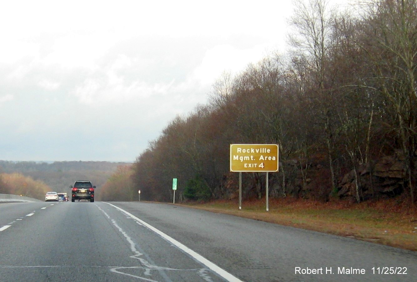 Image of ground mounted brown cultural attractions sign for the Hopkinton exit on I-95 North, November 2022