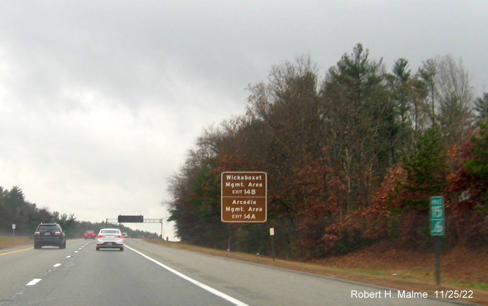 Image of brown cultural attractions sign for RI 102 exits with new milepost based exit numbers on I-95 South in West Greenwich, November 2022