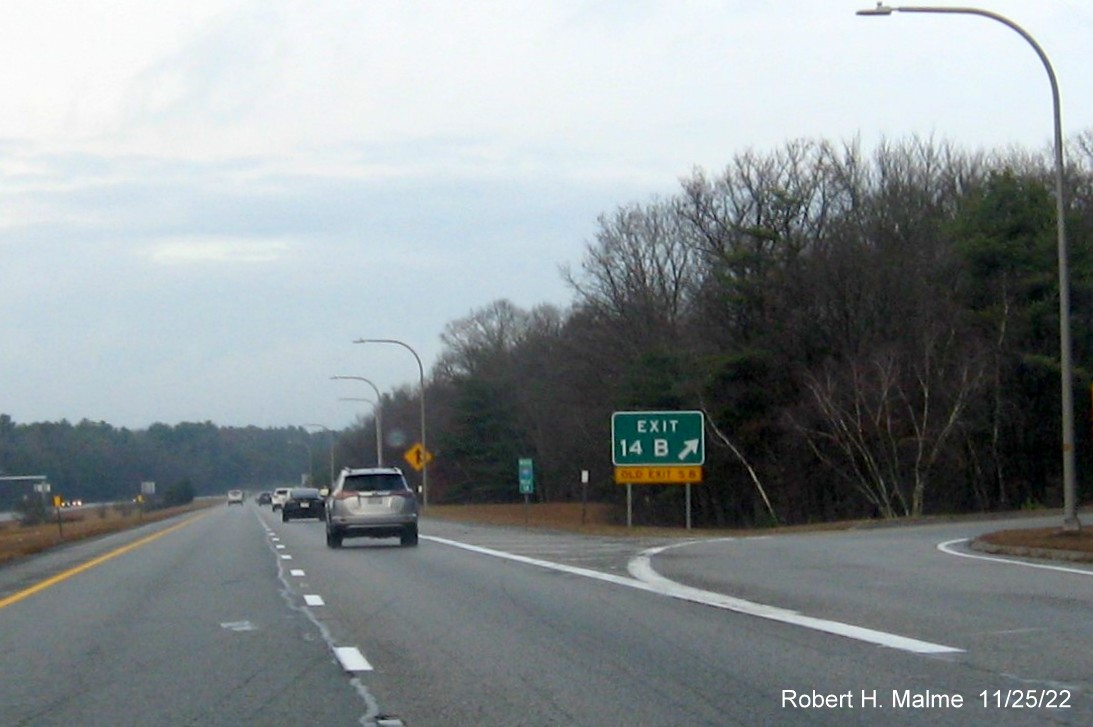 Image of gore sign for RI 102 North exit with new milepost based exit number and yellow Old Exit 5B advisory sign below on I-95 North in West Greenwich, November 2022