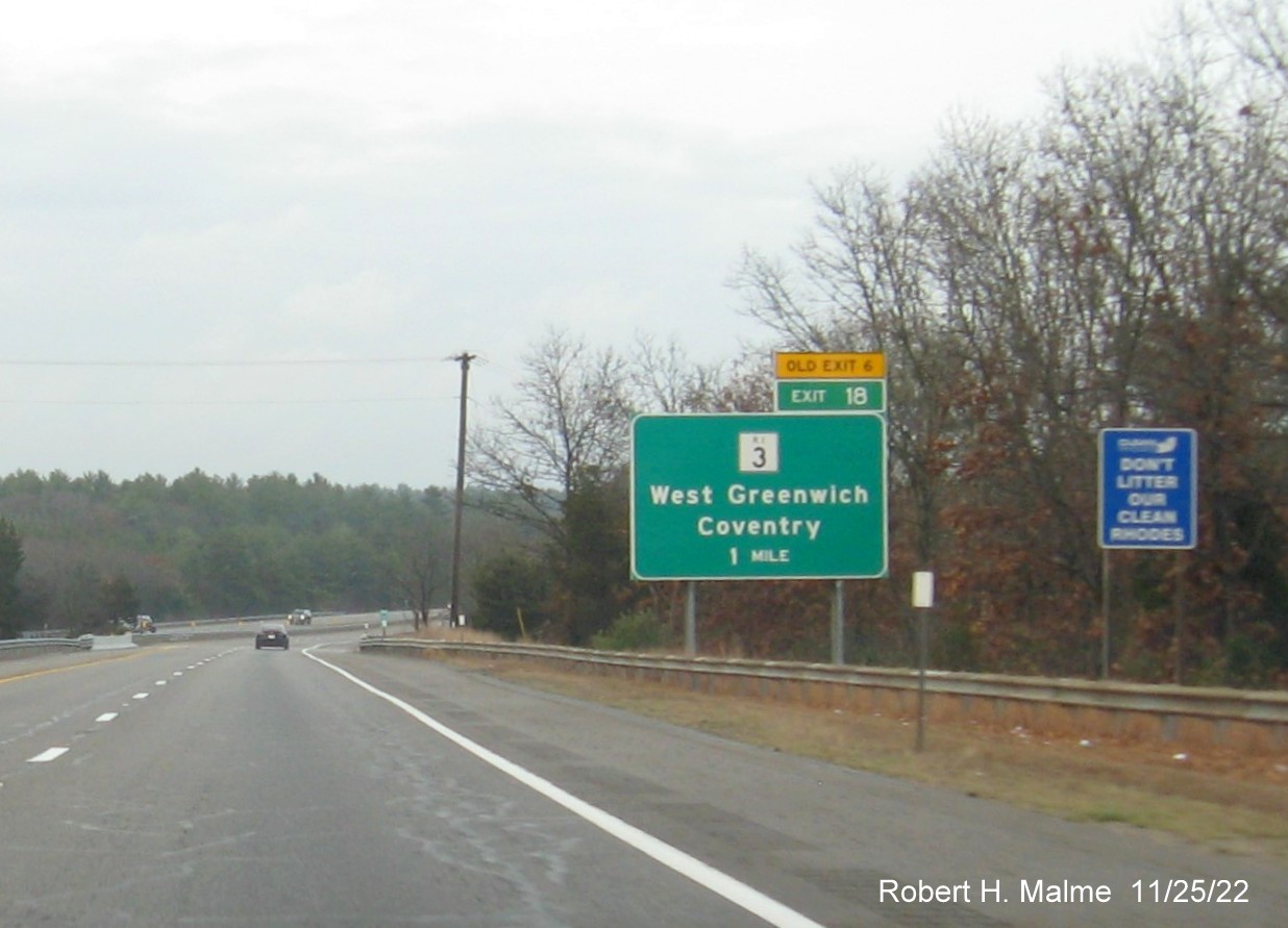 Image of ground mounted 1 mile advance sign for RI 3 exit with new milepost based exit number and yellow Old Exit 6 advisory sign above exit tab on I-95 North in West Greenwich, November 2022