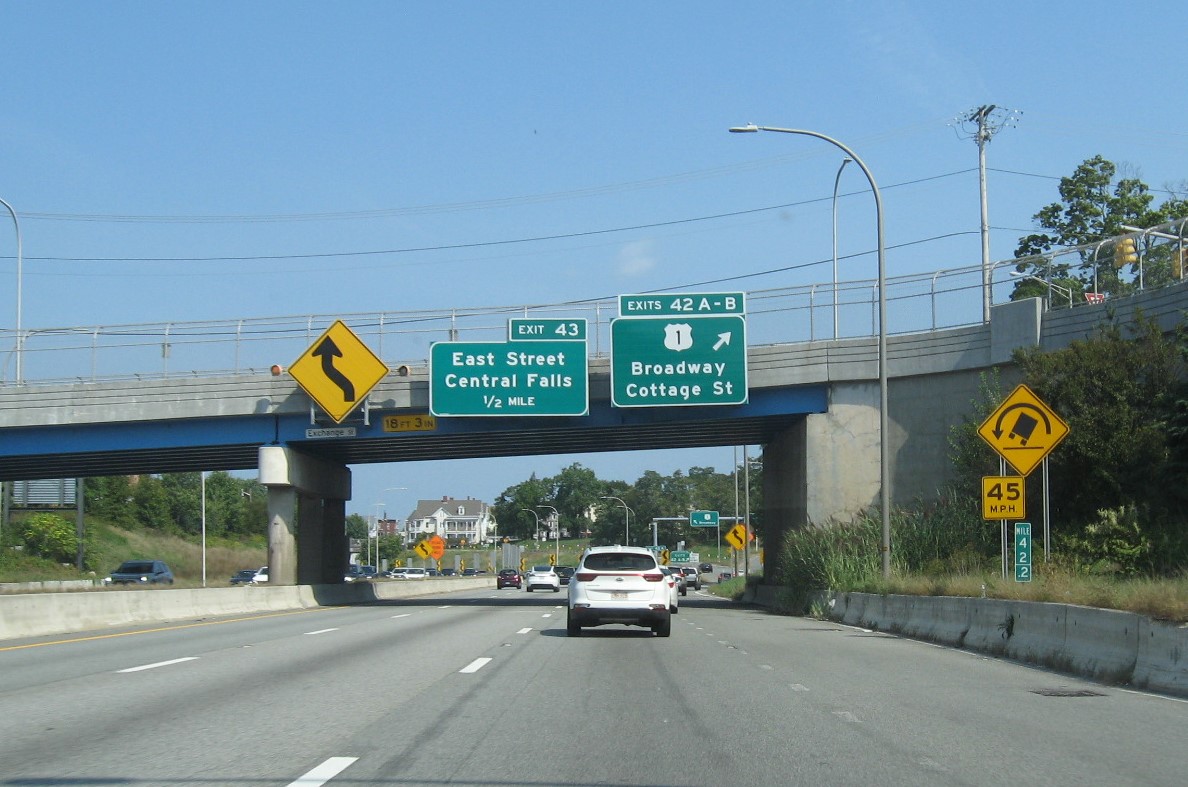 Image of 1 mile advance bridge mounted sign for East Street exit with new milepost based exit number on I-95 North in Pawtucket, September 2022