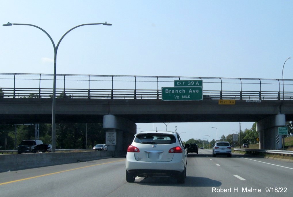 Image of bridge mounted 1 mile advance overhead sign for Branch Avenue exit with new milepost based exit number on I-95 South in Providence, September 2022