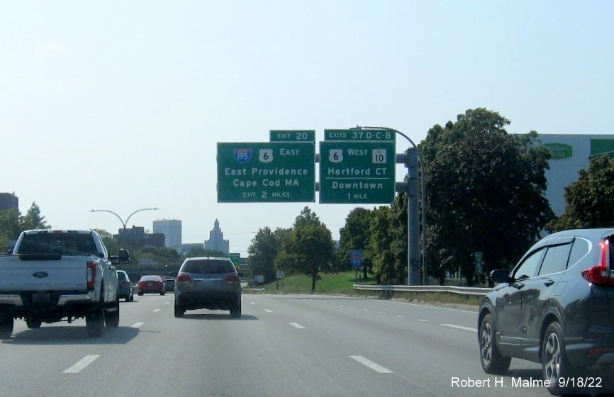 Image of 1 mile advance overhead sign for US 6 West/RI 10 and Downtown exits with new milepost based exit numbers on I-95 South in Providence, September 2022