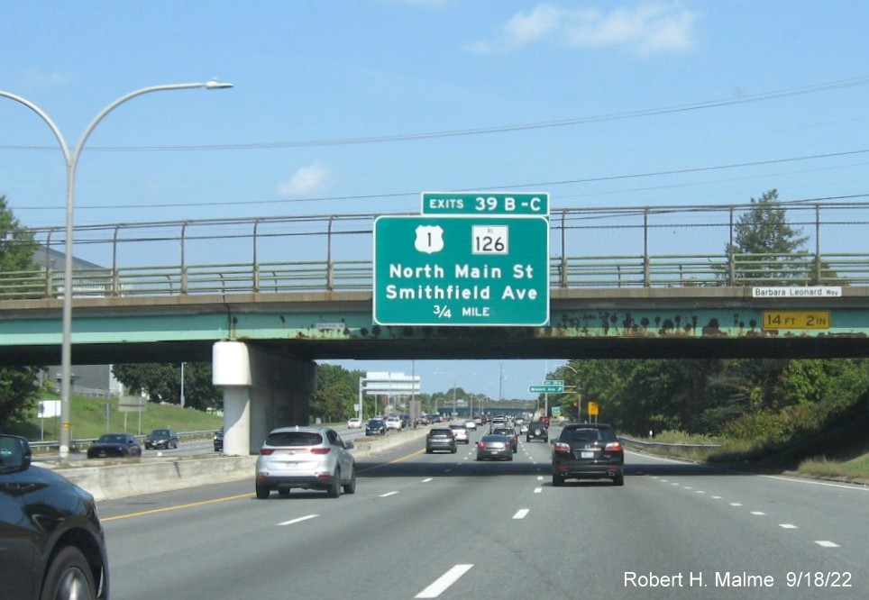 Image of bridge mounted 1/2 mile advance sign for US 1/RI 126 exits with new milepost based exit numbers on I-95 North in Providence, September 2022