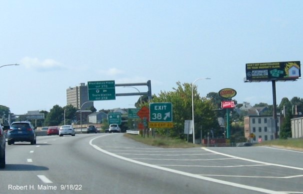 Image of 1/2 mile advance overhead sign for US 6 West/RI 10 and downtown exits with new milepost based exit numbers on I-95 South in Providence, September 2022