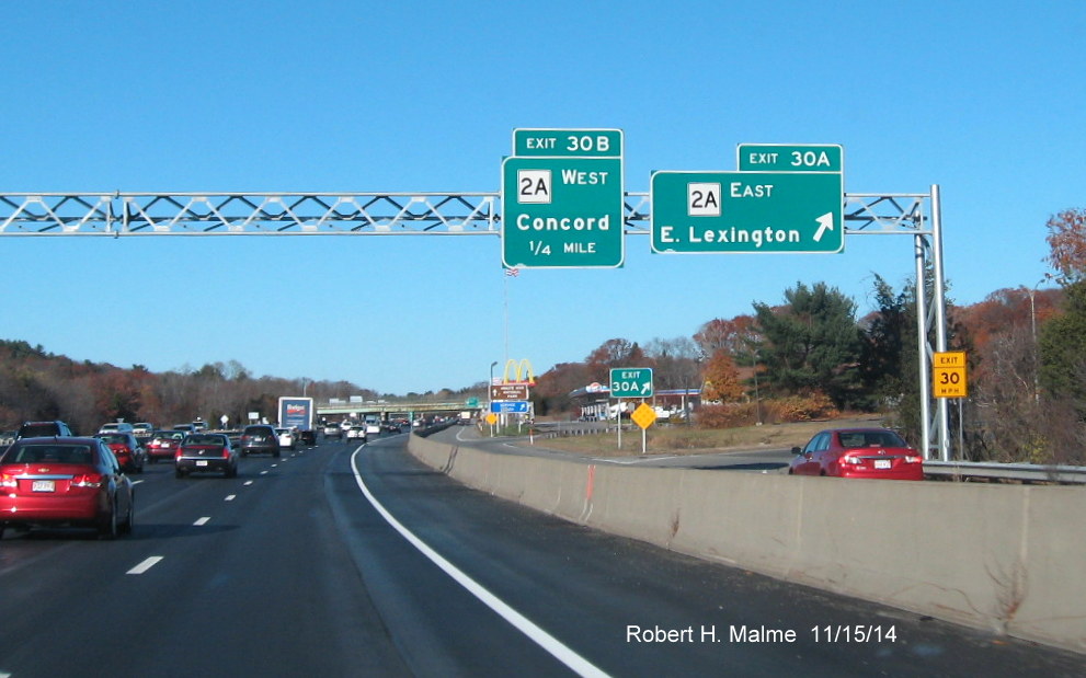 Image of the new overhead sign assembly on the C/D ramps at the MA 2A exit off of I-95 in Lexington