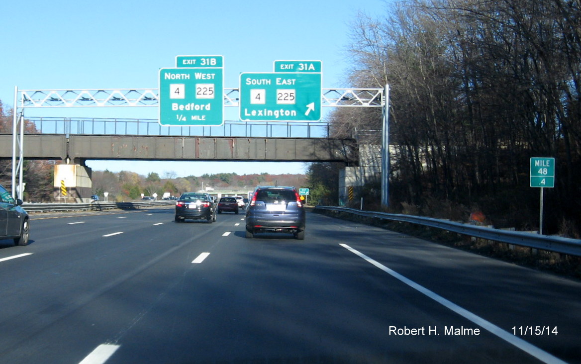 Image of overhead signs put up in 2013 for MA 4/225 exit on I-95 North in Lexington