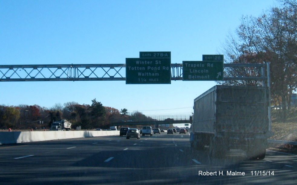 Image of new overhead exit signs for Trapelo Road and Totten Pond Rd on I-95 South in 
  Lincoln