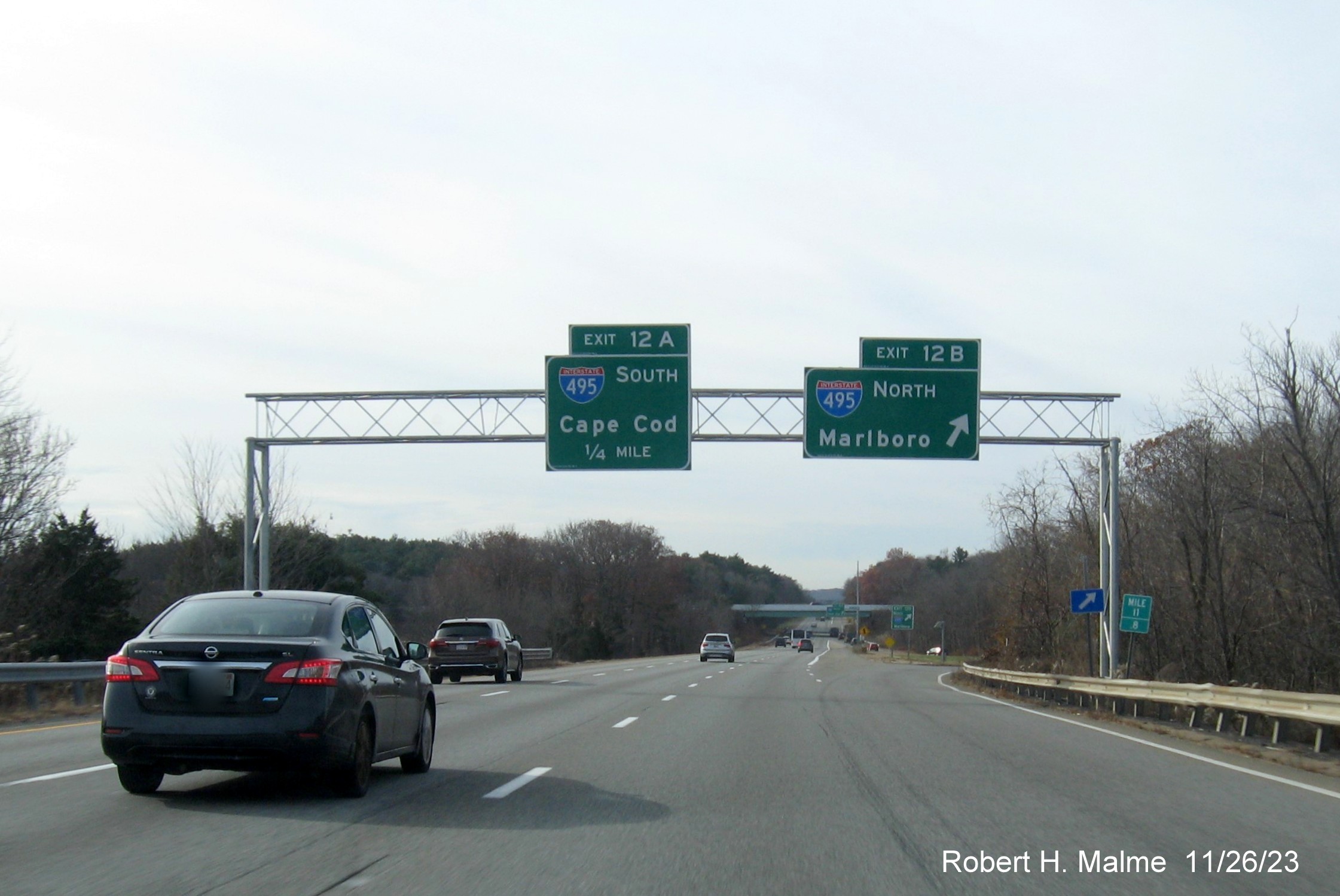 Image of recently replaced overhead signs at the ramp for I-495 North on I-95 South in Foxboro, November 2023