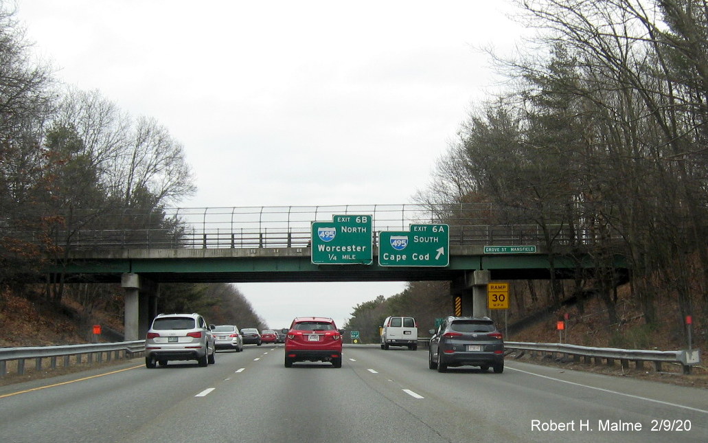 Image of orange contractor tags marking future location of overhead signs at the ramp to I-495 South on I-95 North in Mansfield