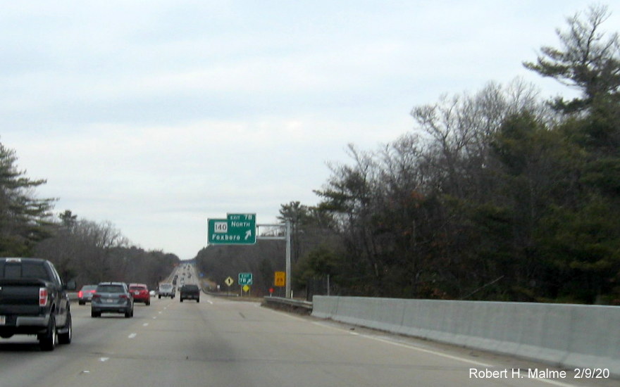 Image of orange contractor tag marking future placement of overhead ramp sign for MA 140 North exit on I-95 North in Foxboro