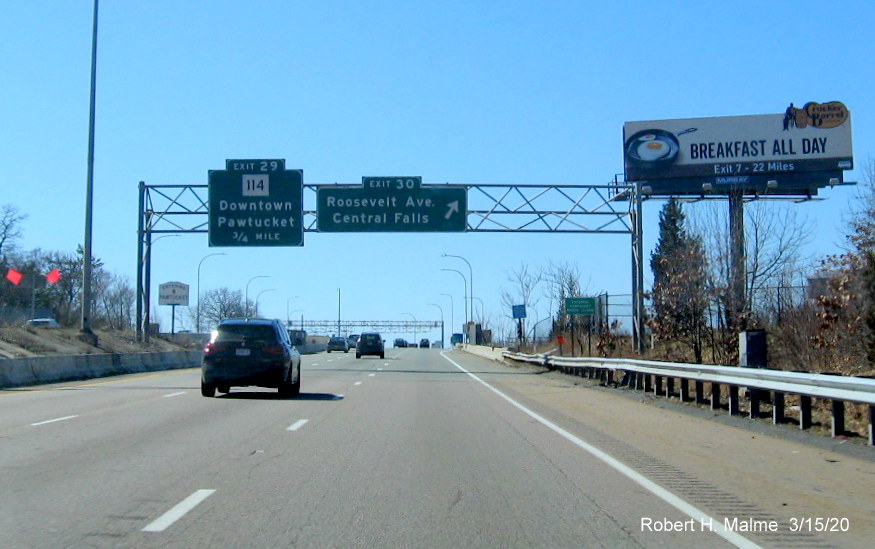 Image of orange contractor tag marking future site of overhead sign gantry for RI exits on I-95 South in Attleboro