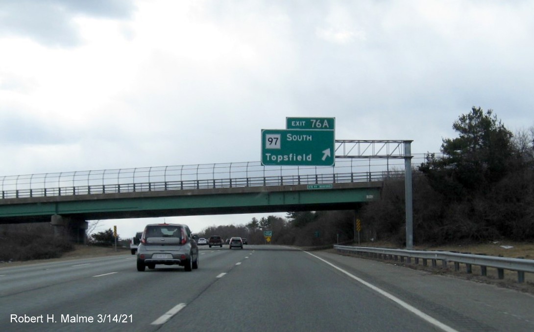 Image of overhead signage at ramp for MA 97 South exit with new milepost based exit number on I-95 South in Boxford, March 2021