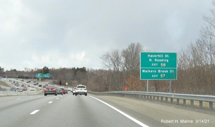 Image of ground MA 129 exit with new milepost based exit numbers on I-95/MA 128 South in Wakefield, March 2021