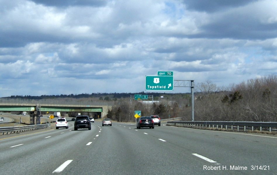 Image of overhead ramp sign for US 1 exit with new milepost based exit number on I-95 North in Danvers, March 2021