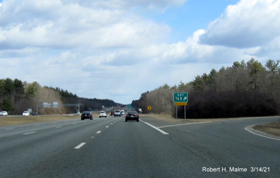 Image of gore sign for MA 97 South exit with new milepost based exit number and yellow old exit number advisory sign below on I-95 South in Boxford, March 2021