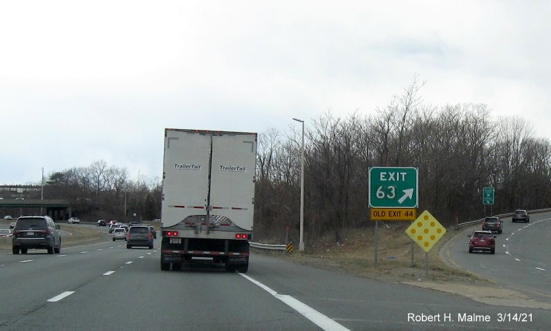 Image of gore signage at ramp for US 1 exit with new milepost based exit number on I-95/MA 128 South in Peabody, March 2021