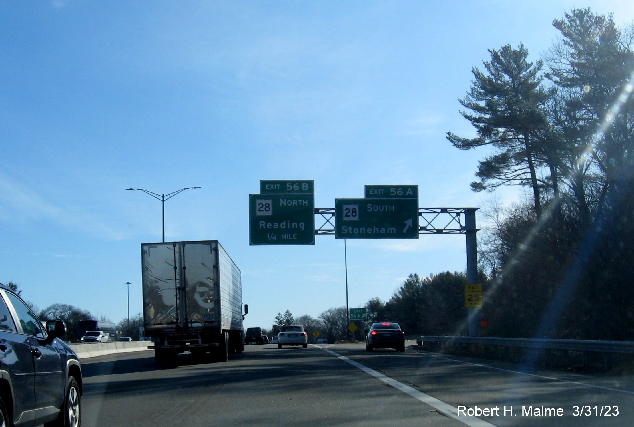 Image of recently updated overhead signage at the exit ramp to MA 28 South on I-95/MA 128 in Reading, March 2023