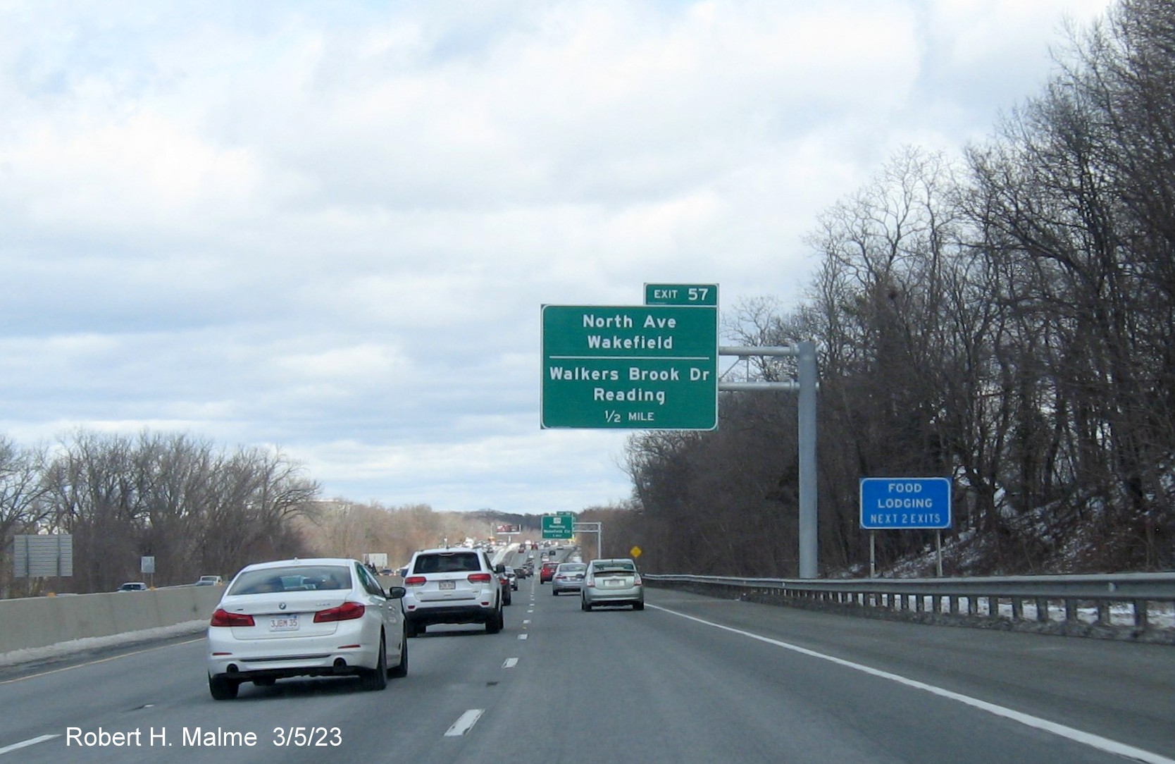 Image of recently placed 1 mile advance overhead sign for North Avenue/Walkers Brook Drive exit on
                                     I-95/MA 128 North in Reading, March 2023