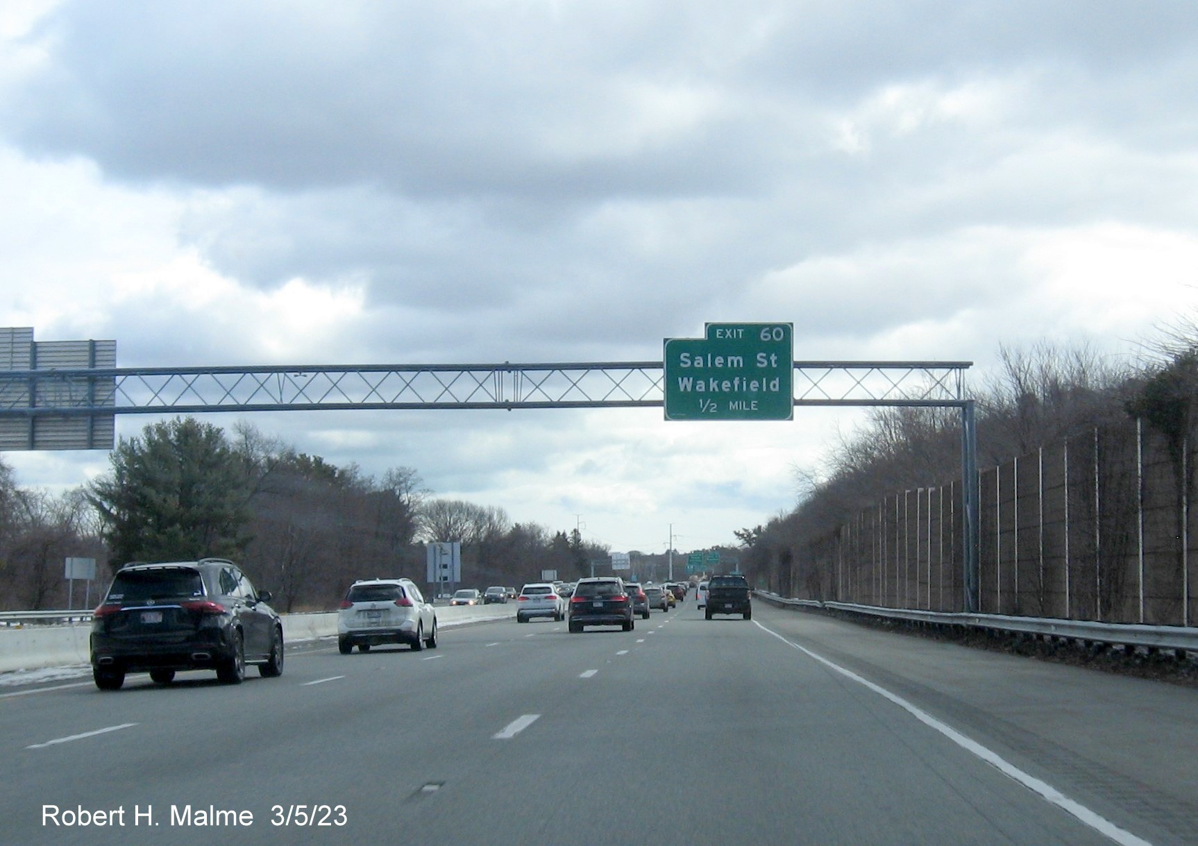 Image of recently placed 1/2 mile advance overhead sign for Salem Street exit on
                                     I-95/MA 128 North in Wakefield, March 2023