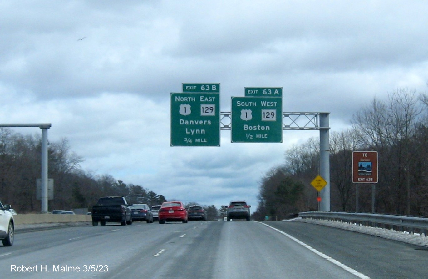Image of recently placed advance overhead signage for US 1/ MA 129 exits on
                                     I-95/MA 128 North in Lynnfield, March 2023
