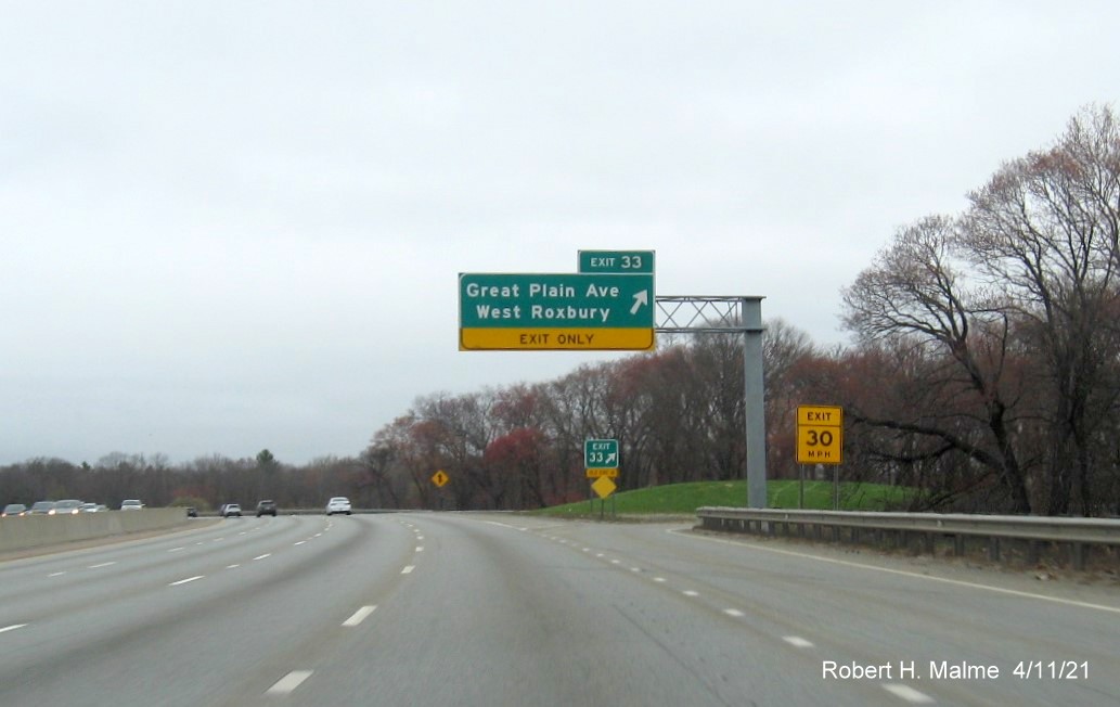 Image of overhead ramp sign for Great Plain Avenue exit with new milepost based exit number on I-95/MA
                                           128 North in Dedham, April 2021