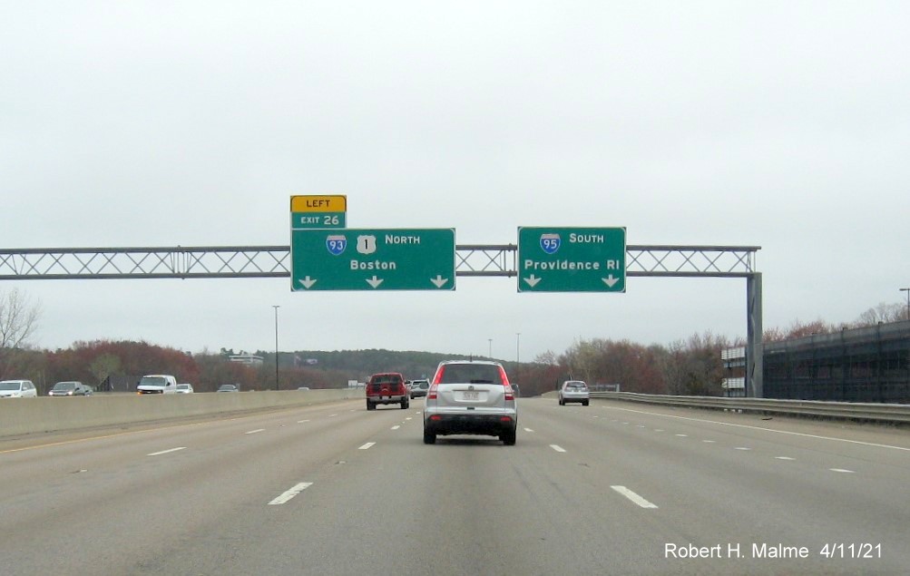 Image of 1/2 Mile advance overhead sign for North I-93/US 1 exit with new milepost based exit number on I-95/MA 128 South, US 1 North in Westwood, April 2021 