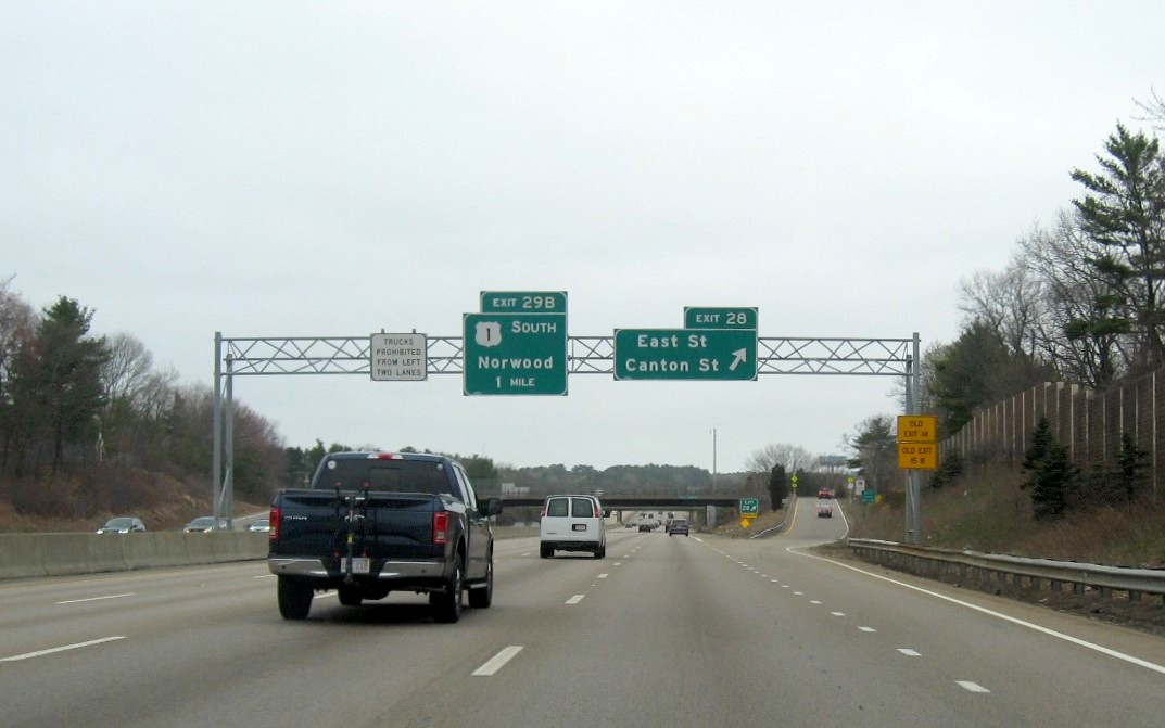 Image of overhead signage at ramp for Canton Street/East Street exit with new milepost based exit number on I-95/MA 128 North, US 1 South in Canton, April 2021