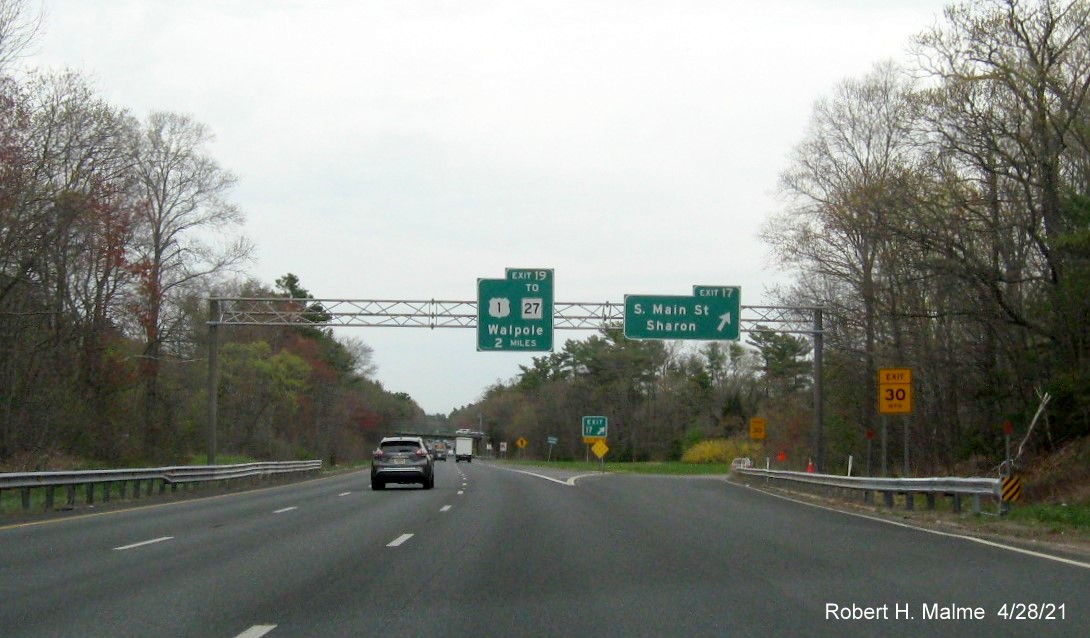Image of overhead ramp sign for South Main Street exit with new milepost based exit number on I-95 North in Foxboro, April 2021