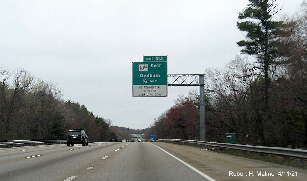 Image of 1/2 Mile advance overhead sign for MA 109 East exit with new milepost based exit numbers on I-95/MA 128 North in Dedham, April 2021